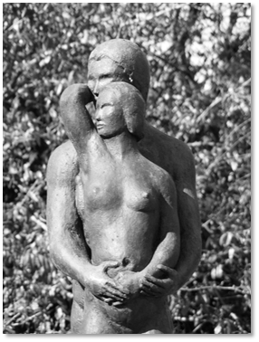 Sculpture .. nakend man and women standing, man embracing women from behind